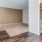 a kitchen with a wood floor