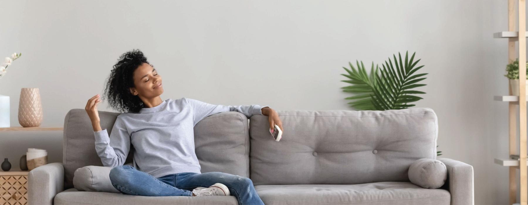 a person sitting on a couch